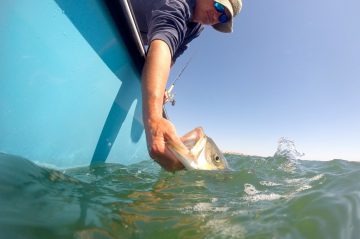 Man holding a fish