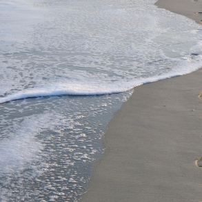 Close up of footprints in sand