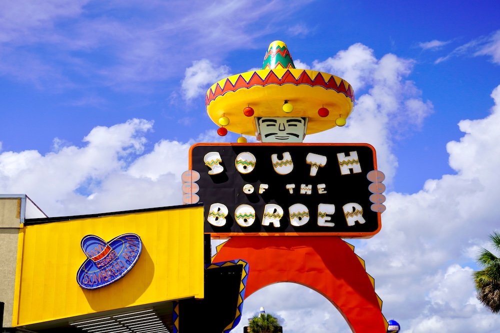 South of the Border, attraction on Interstate 95 (I-95) south of the border between North Carolina and South Carolina. Campy faux-Mexican style theme. Sombrero restaurant. 